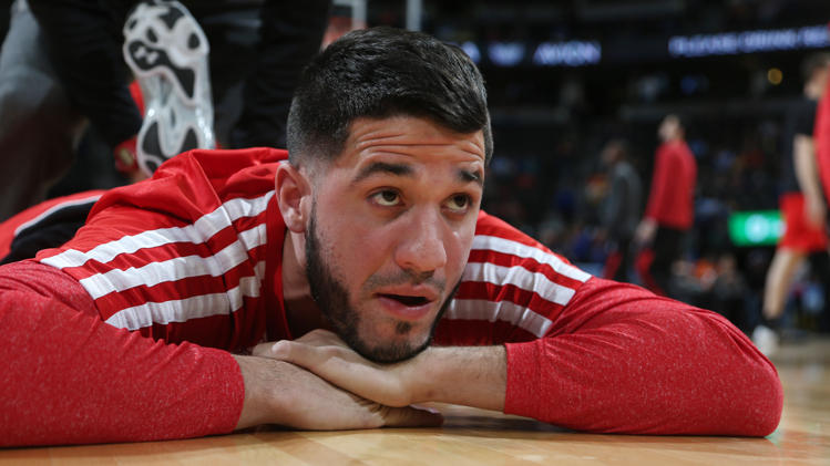 Toronto Raptors guard Greivis Vasquez, of Venezuela, warms up before facing the Denver Nuggets in the first quarter of an NBA basketball game in Denver on Friday, Jan. 31, 2014. (AP Photo/David Zalubowski)