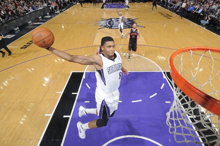 SACRAMENTO, CA - FEBRUARY 5: Rudy Gay #8 of the Sacramento Kings dunks against the Toronto Raptors on February 5, 2014 at Sleep Train Arena in Sacramento, California. NOTE TO USER: User expressly acknowledges and agrees that, by downloading and or using this photograph, User is consenting to the terms and conditions of the Getty Images Agreement. Mandatory Copyright Notice: Copyright 2014 NBAE (Photo by Rocky Widner/NBAE via Getty Images)