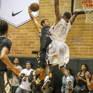 Amir Johnson defending the rim against Jay Sweeney in Drew League