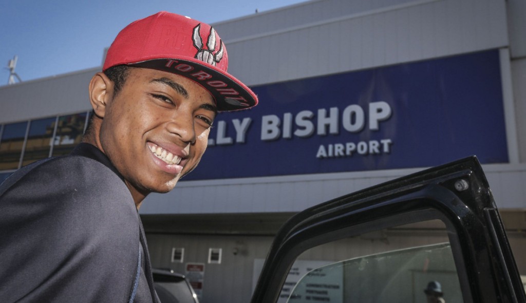 Brazilian Basketball player Bruno Caboclo drafted 20th over all by the Raptors arrives on Porter Airlines  from Newark NJ at Billy Bishop Airport in Toronto. Toronto Star reporter Isabel Teotonio (in Red) talks to Bruno as he arrived.