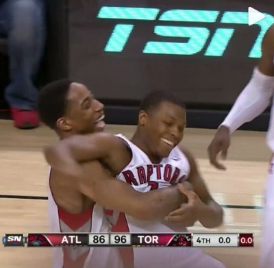 Lowry and DeMar hug it out