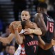 Golden State Warriors' Stephen Curry strips the ball from Toronto Raptors' Kyle Lowry (7) during the second half of an NBA basketball game Friday, Jan. 2, 2015, in Oakland, Calif. Golden State won 126-105. (AP Photo/Marcio Jose Sanchez)