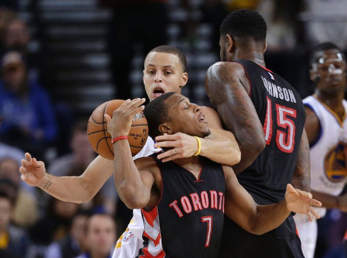 Golden State Warriors' Stephen Curry strips the ball from Toronto Raptors' Kyle Lowry (7) during the second half of an NBA basketball game Friday, Jan. 2, 2015, in Oakland, Calif. Golden State won 126-105. (AP Photo/Marcio Jose Sanchez)