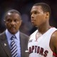 Toronto Raptors guard Kyle Lowry and coach Dwane Casey walk off the court at the end of the team's 103-95 loss to the Charlotte Hornets in an NBA basketball game in Toronto on Thursday, Jan, 8, 2015. (AP Photo/The Canadian Press, Frank Gunn)