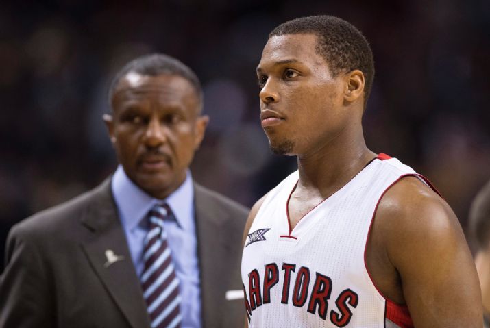 Toronto Raptors guard Kyle Lowry and coach Dwane Casey walk off the court at the end of the team's 103-95 loss to the Charlotte Hornets in an NBA basketball game in Toronto on Thursday, Jan, 8, 2015. (AP Photo/The Canadian Press, Frank Gunn)
