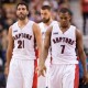 Toronto Raptors Kyle Lowry (7), Greivis Vasquez (21) and Jonas Valanciunas walk downcourt during the dying seconds of a loss to the New Orleans Pelicans in NBA basketball game action in Toronto, Sunday, Jan. 18, 2015. (AP Photo/The Canadian Press, Frank Gunn)