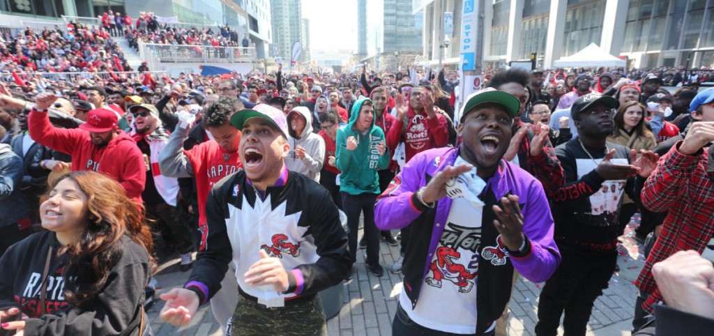 Raptor fans Anthony Hayle (left and Nickoy Peterkin , both in Raptor jerseys, shoe emotion during the first Toronto Raptors vs Brooklyn Nets playoff game in Maple Leaf Square
