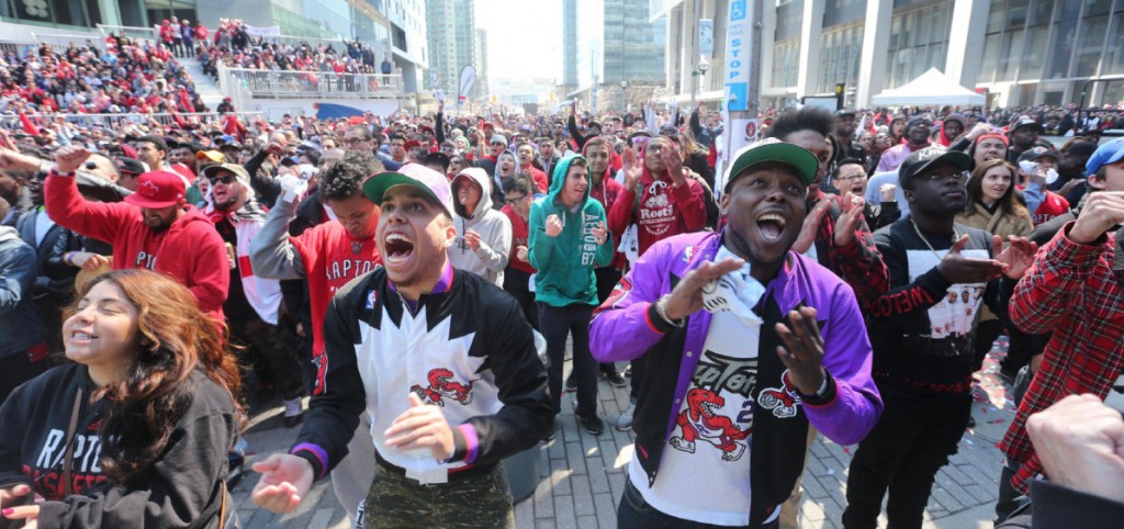 Raptor fans Anthony Hayle (left  and Nickoy Peterkin , both in Raptor jerseys, shoe emotion during the first Toronto Raptors vs Brooklyn Nets playoff game in Maple Leaf Square