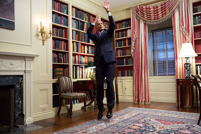 President Barack Obama feigns a jump shot during an Affordable Care Act video taping for BuzzFeed in the White House Library, Feb. 10, 2015. (Official White House Photo by Amanda Lucidon) This official White House photograph is being made available only for publication by news organizations and/or for personal use printing by the subject(s) of the photograph. The photograph may not be manipulated in any way and may not be used in commercial or political materials, advertisements, emails, products, promotions that in any way suggests approval or endorsement of the President, the First Family, or the White House.