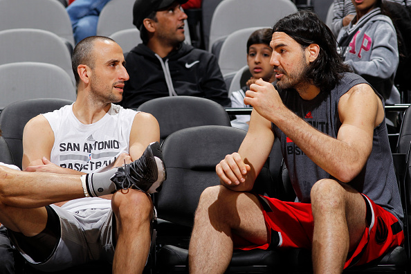 SAN ANTONIO, TX - APRIL 2: Manu Ginobili #20 of the San Antonio Spurs and Luis Scola #4 of the Toronto Raptors before the game on April 2, 2016 at AT&T Center in San Antonio, Texas. NOTE TO USER: User expressly acknowledges and agrees that, by downloading and or using this Photograph, user is consenting to the terms and conditions of the Getty Images License Agreement. Mandatory Copyright Notice: Copyright 2016 NBAE (Photo by Chris Covatta/NBAE via Getty Images)