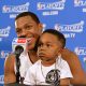 TORONTO, ON - MAY 4: Kyle Lowry #7 of the Toronto Raptors speaks to the media with his son after Game Seven of the Eastern Conference Quarterfinals against the Brooklyn Nets during the NBA Playoffs at the Air Canada Centre on May 4, 2014 in Toronto, Ontario, Canada. NOTE TO USER: User expressly acknowledges and agrees that, by downloading and/or using this photograph, user is consenting to the terms and conditions of the Getty Images License Agreement. Mandatory Copyright Notice: Copyright 2014 NBAE (Photo by Ron Turenne/NBAE via Getty Images)