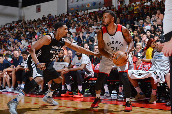 LAS VEGAS, NV - JULY 10: Norman Powell #24 of the Toronto Raptors defends the ball against the Minnesota Timberwolves during the 2016 Las Vegas Summer League on July 10, 2016 at Cox Pavillon in Las Vegas, Nevada. NOTE TO USER: User expressly acknowledges and agrees that, by downloading and or using this Photograph, user is consenting to the terms and conditions of the Getty Images License Agreement. Mandatory Copyright Notice: Copyright 2016 NBAE (Photo by David Dow/NBAE via Getty Images)