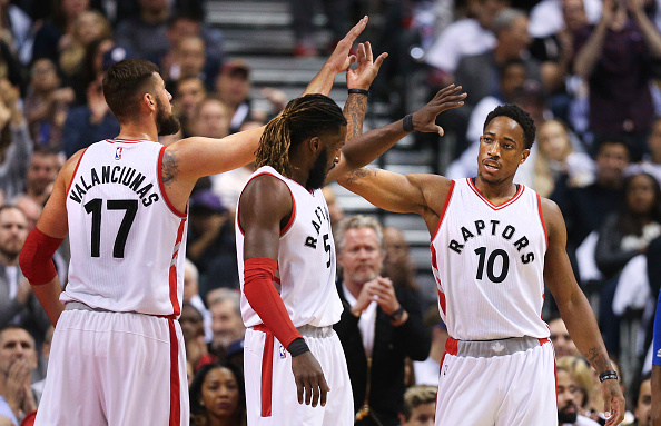 TORONTO, ON - OCTOBER, 26 In first half action, Toronto Raptors guard DeMar DeRozan (10) gets some high fives from team mates after dropping one in and getting fouled. The Toronto Raptors took on the Detroit Pistons at the Air Canada Centre in Toronto in the Raptors home opener. October 26, 2016 Richard Lautens/Toronto Star (Richard Lautens/Toronto Star via Getty Images)