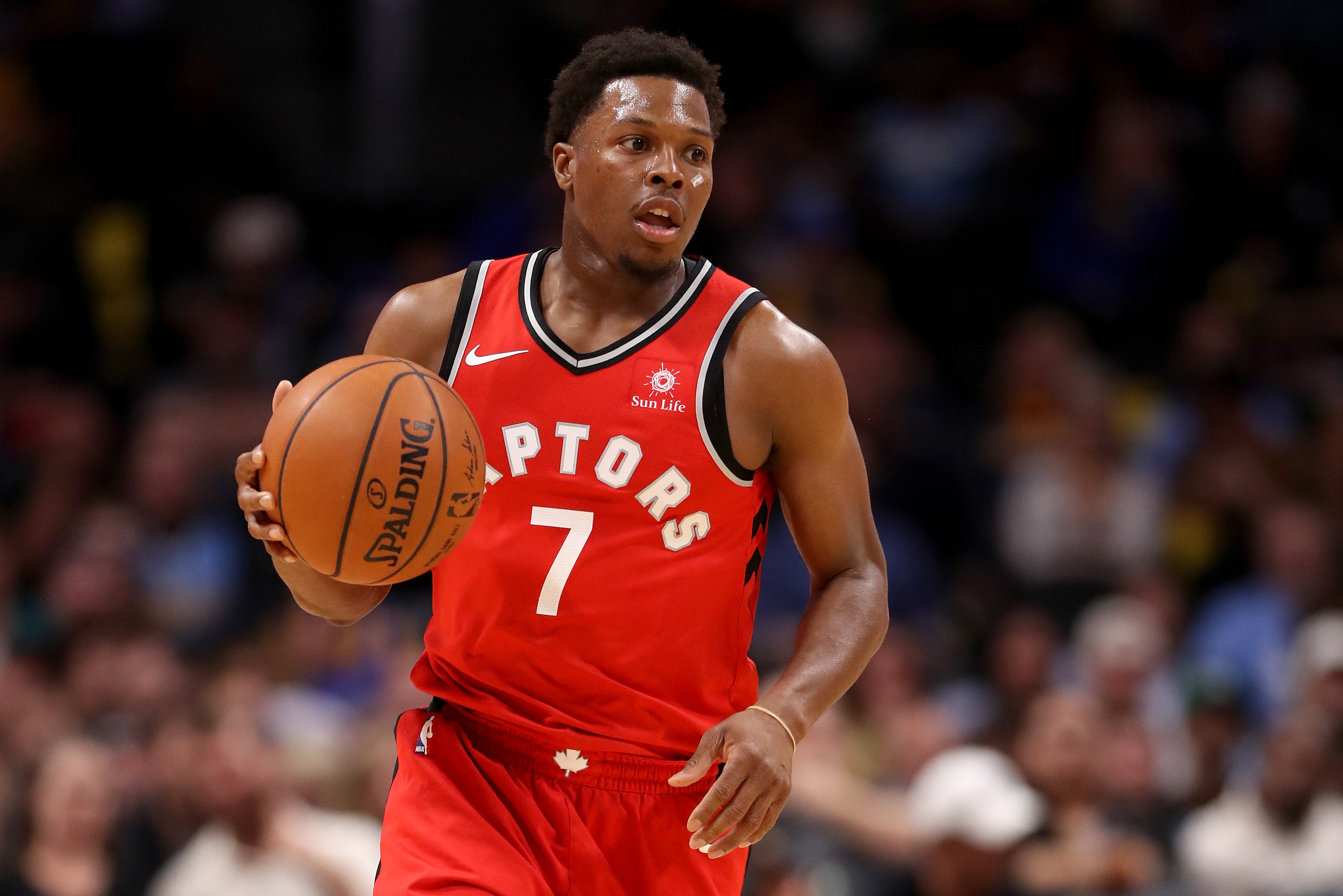 Kyle Lowry, center, a former Villanova player and current Toronto