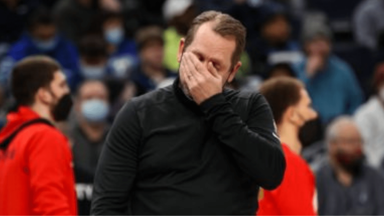 Nick Nurse holding face facepalming