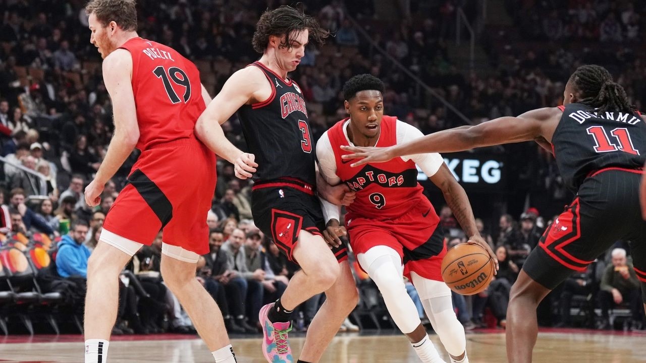 Toronto Raptors guard RJ Barrett (9) controls the ball against Chicago Bulls guard Josh Giddey (3) during the first quarter at Scotiabank Arena.