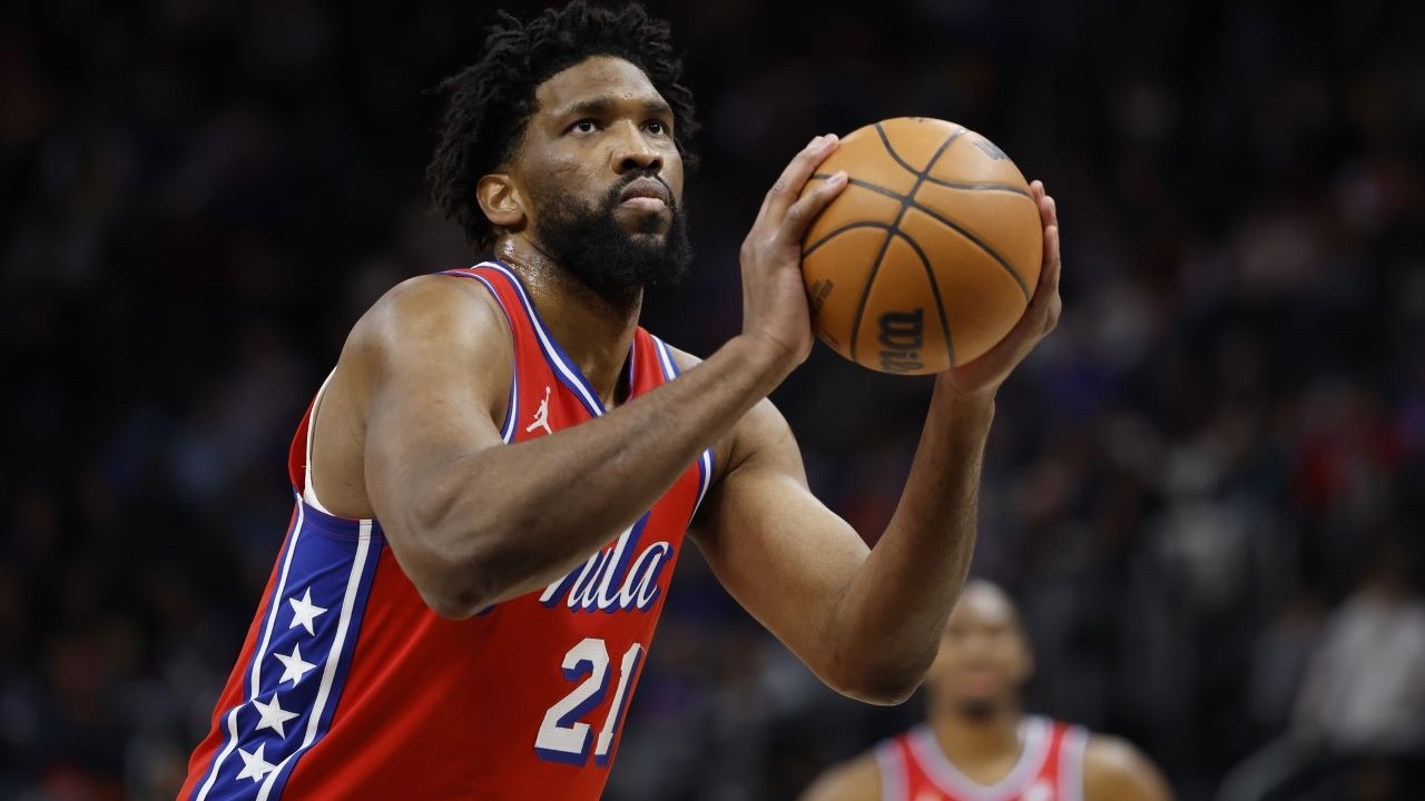 Philadelphia 76ers center Joel Embiid (21) shoots in the first half against the Detroit Red Wings at Little Caesars Arena.